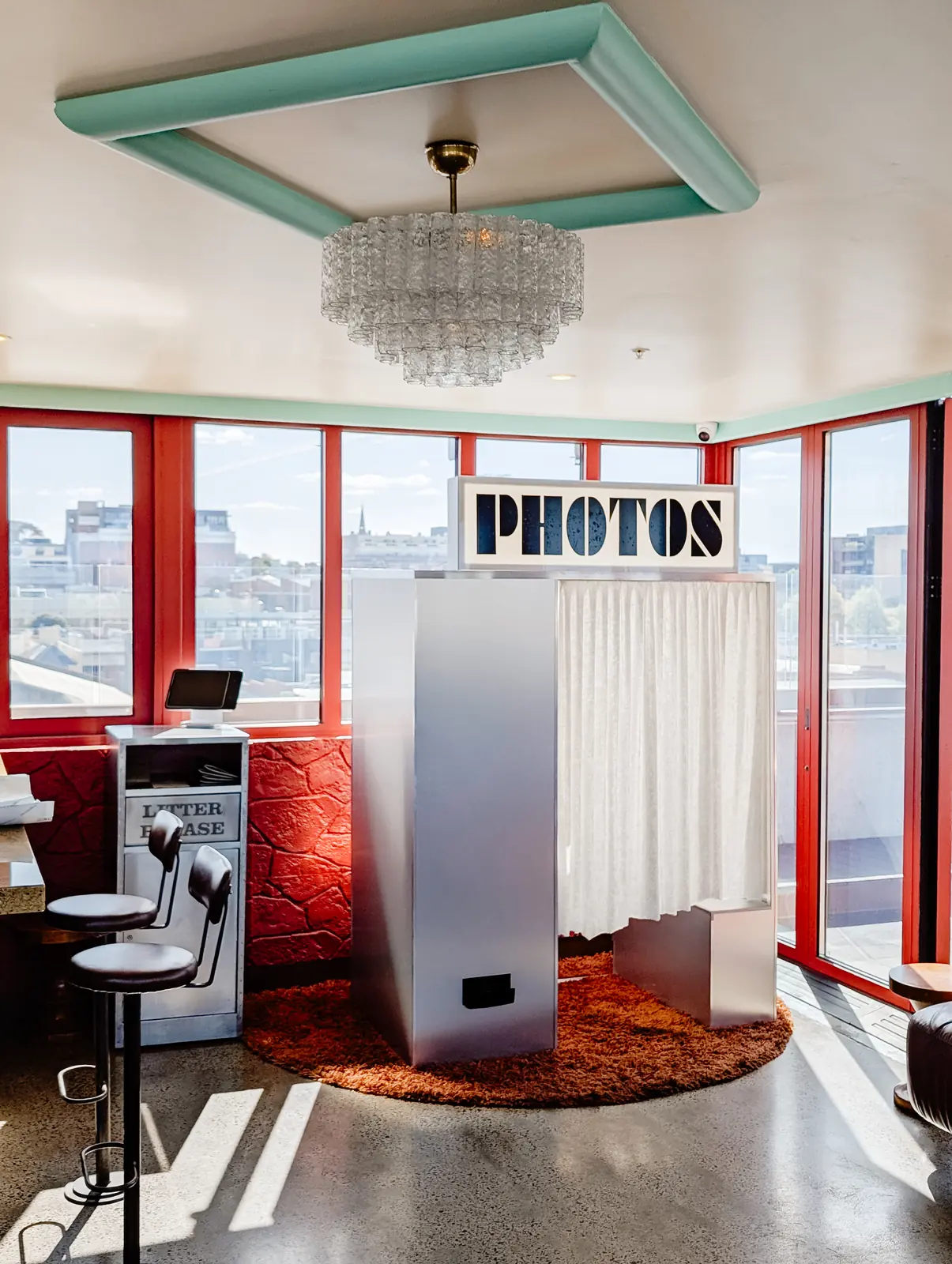 Guests crowded into the booth at a party